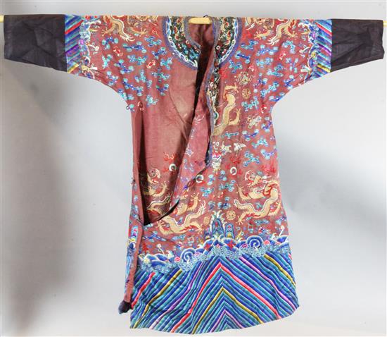 A Chinese claret satin embroidered silk and metal thread dragon robe, late Qing dynasty,